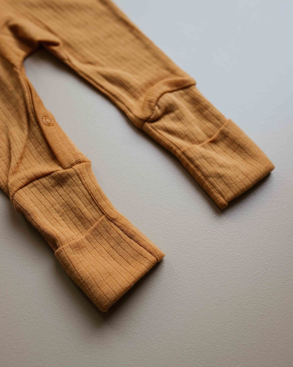 unaduna-detail-shot-jumpsuit-inca-gold