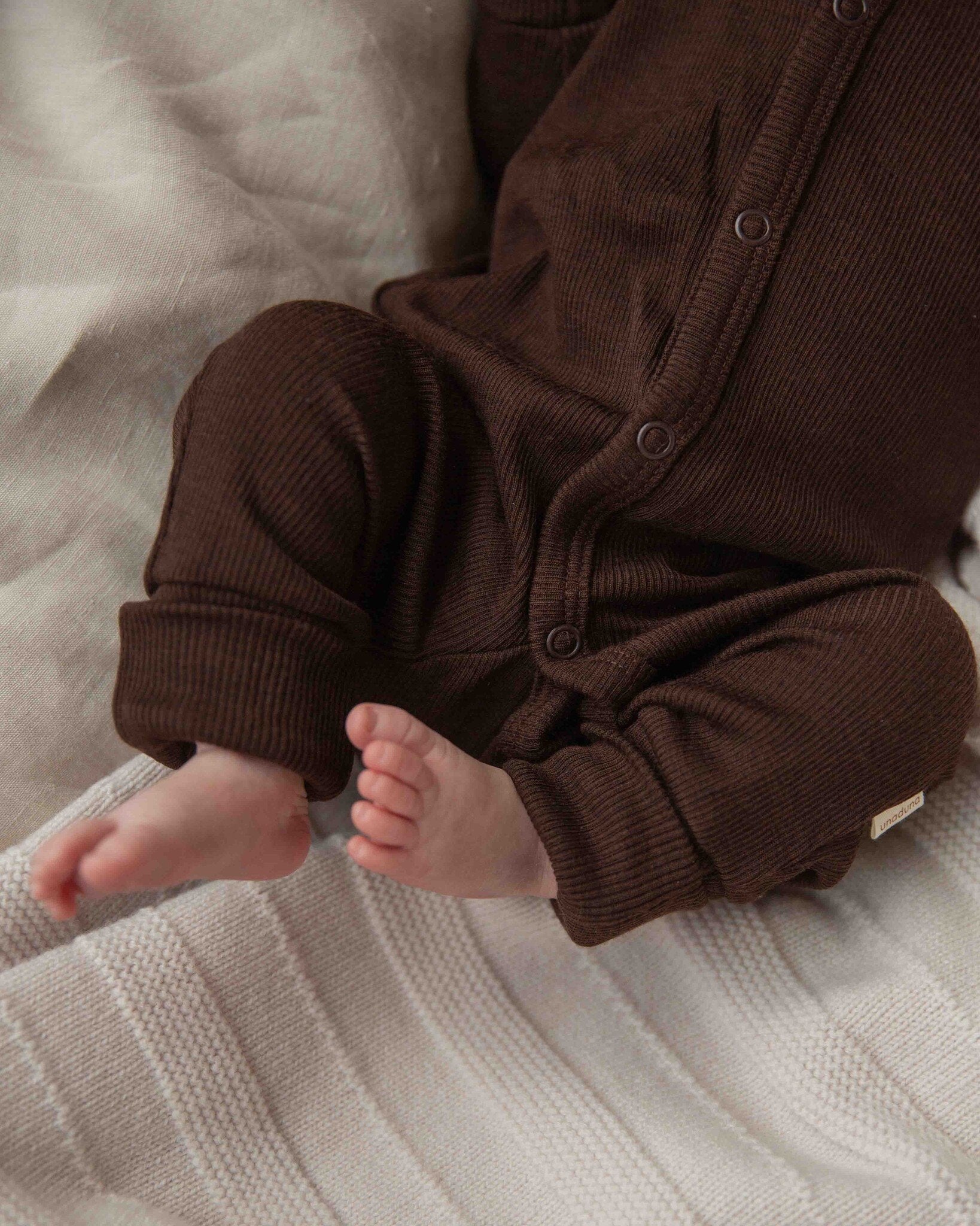 Unaduna jumpsuit donker bruin kladdkaka wol tiny rib