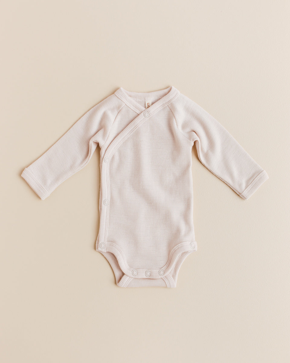 unaduna-wollen-wikkelrompertje-tiny-rib-mazarin